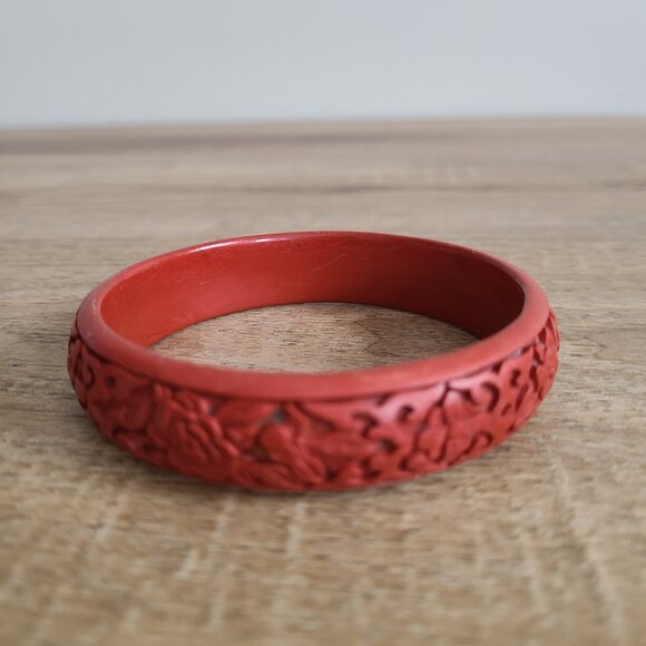 Carved red plastic bangle. - Picture 2 of 5